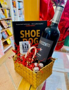 Corporate themed gift basket with wine, chocolates and book